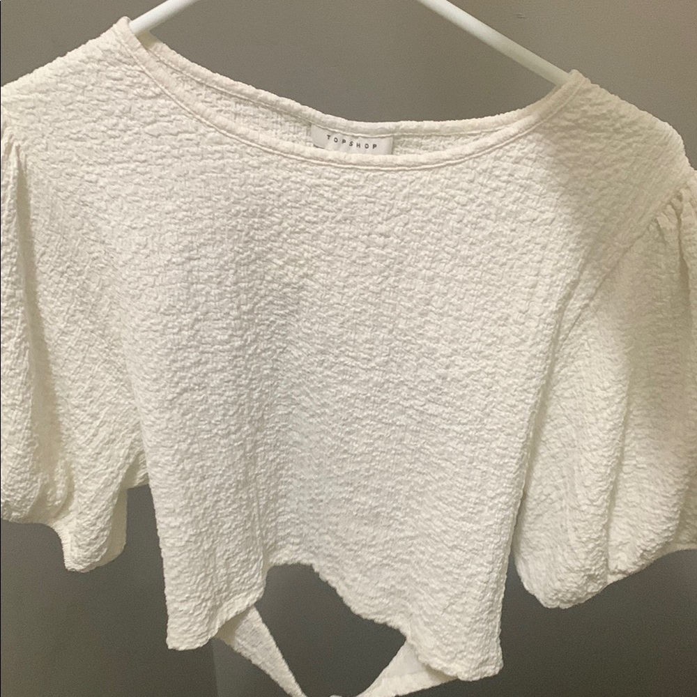 Topshop Cream Textured Blouse with open back and bow.